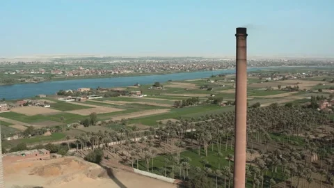 Aerial view of Old big pipe or chimney  in the city. Old brick factory. Stock-Footage 154972667