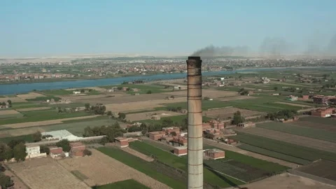 Aerial view of Old big pipe or chimney  in the city. Old brick factory. Stock-Footage 154987769