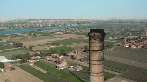 Aerial view of Old big pipe or chimney  in the city. Old brick factory. Stock-Footage 154992253