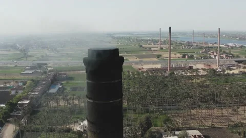 Aerial view of Old big pipe or chimney  in the city. Old brick factory. Stock-Footage 154996676