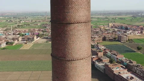 Aerial view of Old big pipe or chimney  in the city. Old brick factory. Stock-Footage 154997760