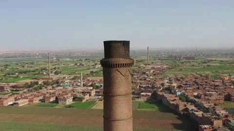 Aerial view of Old big pipe or chimney  in the city. Old brick factory. Stock-Footage 154999295