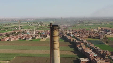 Aerial view of Old big pipe or chimney  in the city. Old brick factory. Stock-Footage 155000717