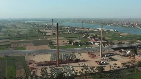 Aerial view of Old big pipe or chimney  in the city. Old brick factory. Stock-Footage 155001022