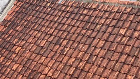 Aerial view of an old clay tile roof 動画素材 339528108