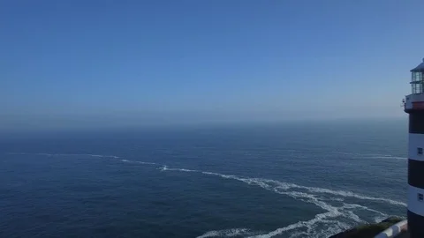 Aerial view of old Head golf and lighthouse ok Kinsale in sunny day - Ireland Stock Footage 84271229