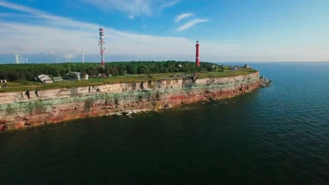 Aerial view of The Old Lighthouse and the power of wind turbines Stock-Footage 87668331