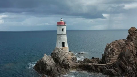 Aerial view of the old lighthouse in cala granu,emerald coast,sardinia 動画素材 127303291