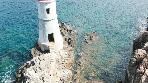 Aerial view of the old lighthouse in cala granu,emerald coast,sardinia 動画素材 127303617