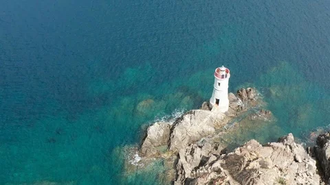Aerial view of the old lighthouse in cala granu,emerald coast,sardinia 動画素材 127303634