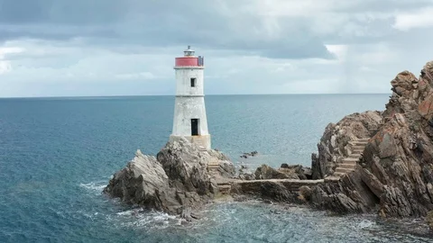 Aerial view of the old lighthouse in cala granu,emerald coast,sardinia Stock-Footage 127304323