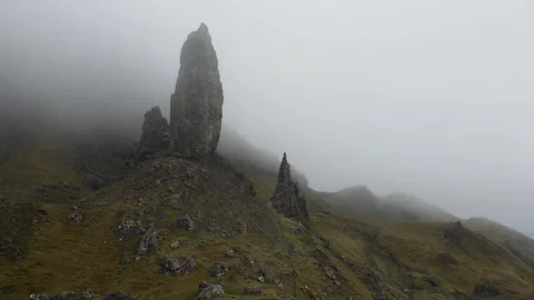 Aerial view of the Old Man Storr. The dramatic and misty environment adds Stock Footage 254520258