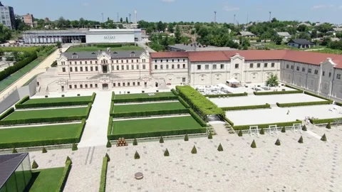 Aerial View of an Old Moldovan Stone Palace with a Large Terraced Park Stock Footage 241323696
