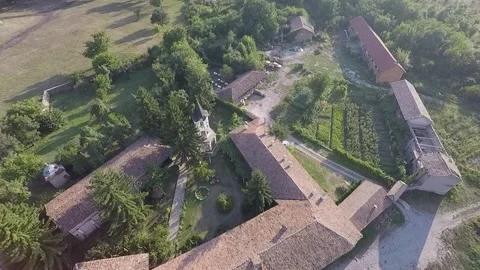 Aerial view of old monastery complex in rural countryside Vídeos de archivo 348367515