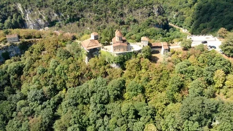 Aerial view of old monastery hiding in the forests, also known as Motsameta Stock Footage 104050375
