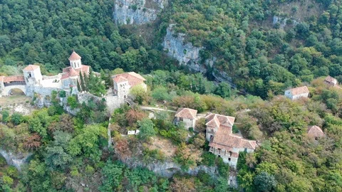 Aerial view of old monastery hiding in the forests, also known as Motsameta Stock Footage 120349161