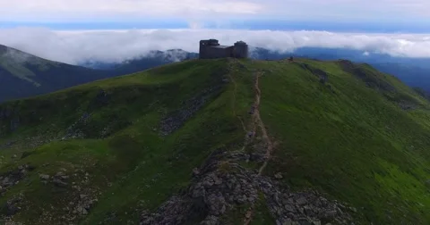 Aerial view of the old observatory on a mountain Pip Ivan, Ukraine, Video stock 65300147