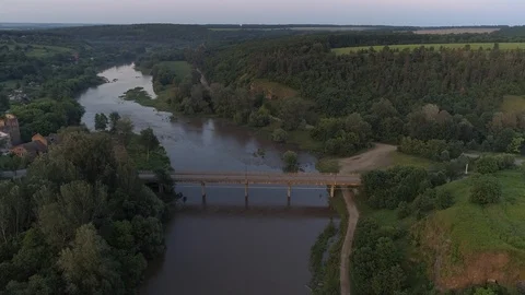 Aerial view old road bridge over the river Stock Footage 112614929