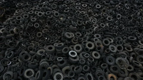 Aerial view old rubber, tyre tire, wheel of cars in recycling factory 4k Stock Footage 68880159