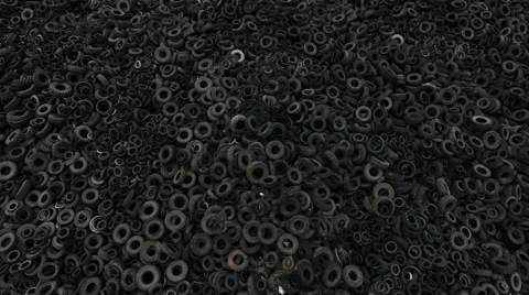 Aerial view old rubber, tyre tire, wheel of cars in recycling factory 4k Stock Footage 68884735