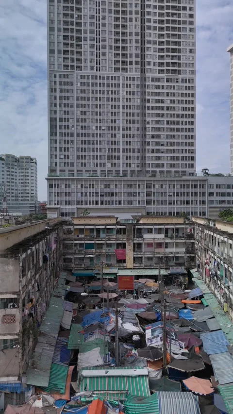 Aerial view of Old run down buildings with wet market in vertical format. Stock Footage 323437931
