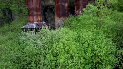 A aerial view of old, rusty machinery and piping equipment Stock Footage 280640577