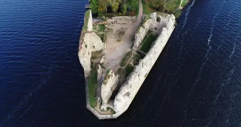 Aerial view of an old stone castle ruins in Koknese, Latvia. Located on a 動画素材 172102278