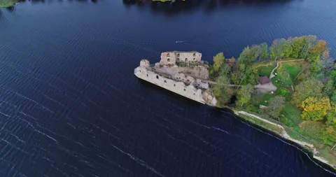 Aerial view of an old stone castle ruins in Koknese, Latvia. Located on a Stock Footage 172102470