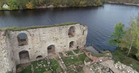 Aerial view of an old stone castle ruins in Koknese, Latvia. Located on a 動画素材 172103093