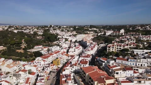 Aerial view of the old town and beach of Carvoeiro Stock Footage 167786260