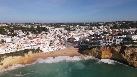Aerial view of the old town and beach of Carvoeiro Stock Footage 167786457