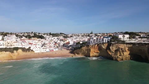 Aerial view of the old town and beach of Carvoeiro Stock Footage 167786784