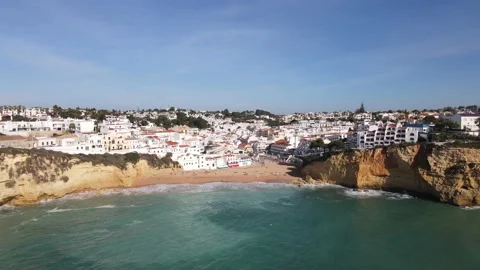 Aerial view of the old town and beach of Carvoeiro Stock Footage 167786831