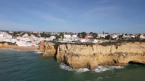 Aerial view of the old town and beach of Carvoeiro Stock Footage 167786836