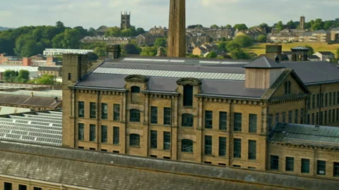 Aerial view of old victorian textile mill in Yorkshire, England Stock Footage 336798412