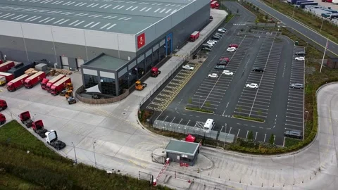 Aerial view OMEGA parcel post distribution hub logistics lorry cargo Stock Footage 162259384