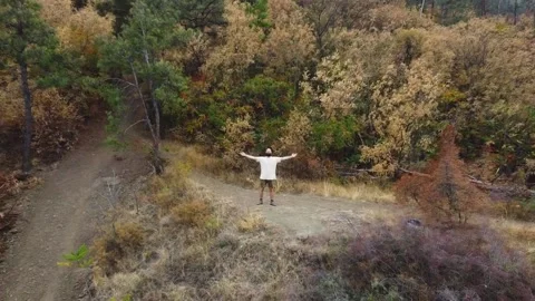 Aerial view. One guy with a beard is on the mountain. Stock Footage 218218321