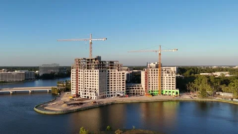 Aerial view of ongoing construction a building by the lake in Texas Houston USA Stock Footage 336816831