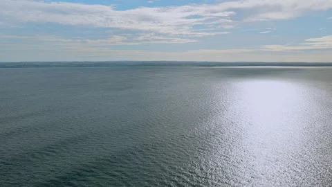 Aerial View Of Open Ocean With Coast Away Видео 337330230
