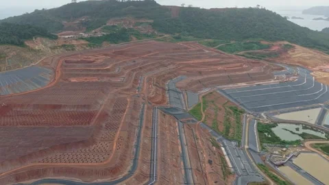 Aerial view of open pit bauxite mining site construction Stock Footage 328919619