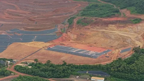 Aerial view of open pit mining and deforestation impact Stock Footage 328919813