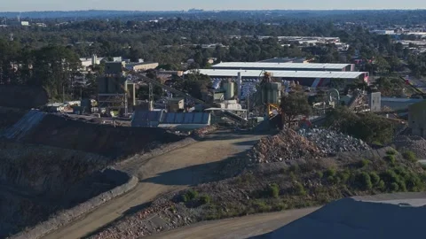 Aerial view of an open pit quarry and processing plant 库存影片 340122993