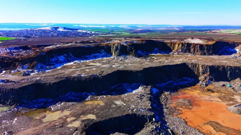 Aerial view of open pit quarry near village, Bulgaria Video stock 343843379