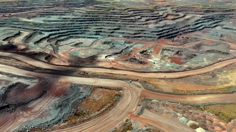 Aerial view of open pit surface mine in South Africa for iron ore extraction Stock Footage 332940539