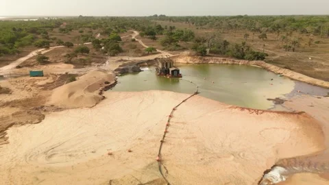 Aerial view open pit zircon mine in Abene in Sengal in Africa, exploitation of Video stock 336181602