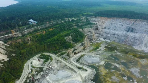 Aerial view of open quarry - top view. quarries for construction with blue sky 스톡 동영상 113530396