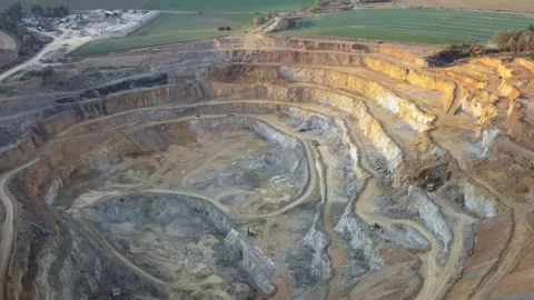 Aerial view of open stone quarry, deep quarry Stock Footage 198240356