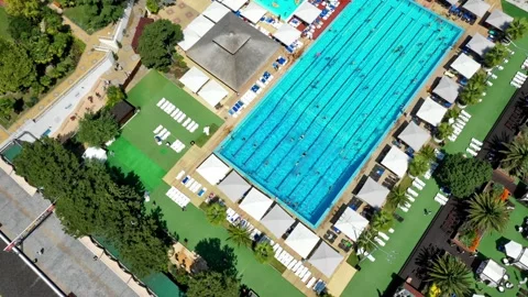 Aerial view on open swimming pool. Resort. Modern territory with open pools Vidéo 148047880