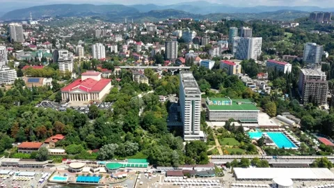 Aerial view on open swimming pool. Resort. Modern territory with open pools Vidéo 148090475