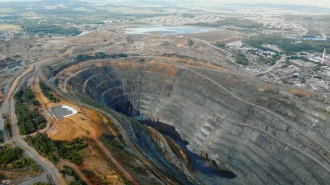 Aerial view opencast mining quarry with machinery at work. Stock Footage 120602340